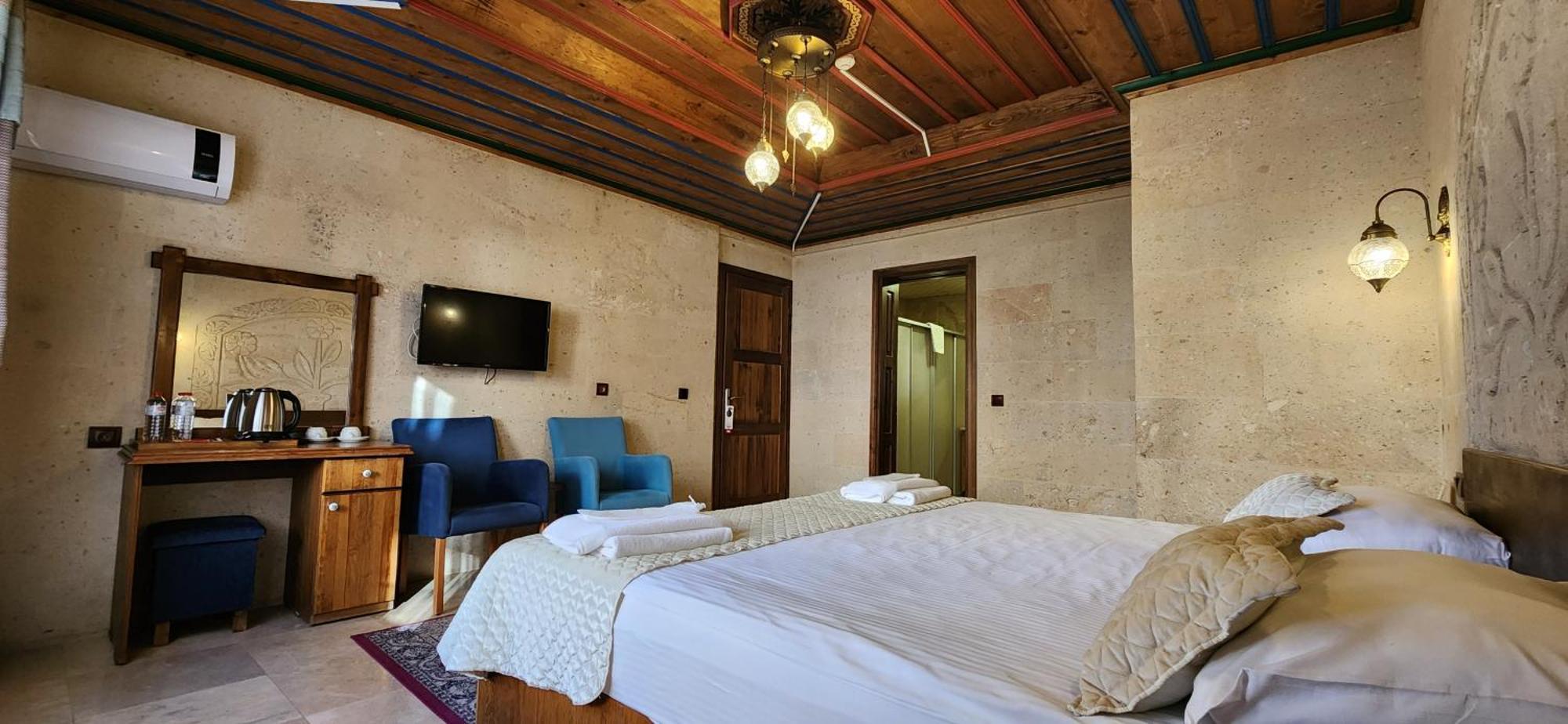 Cappadocia Elite Stone House Bed and Breakfast Göreme Rum bild