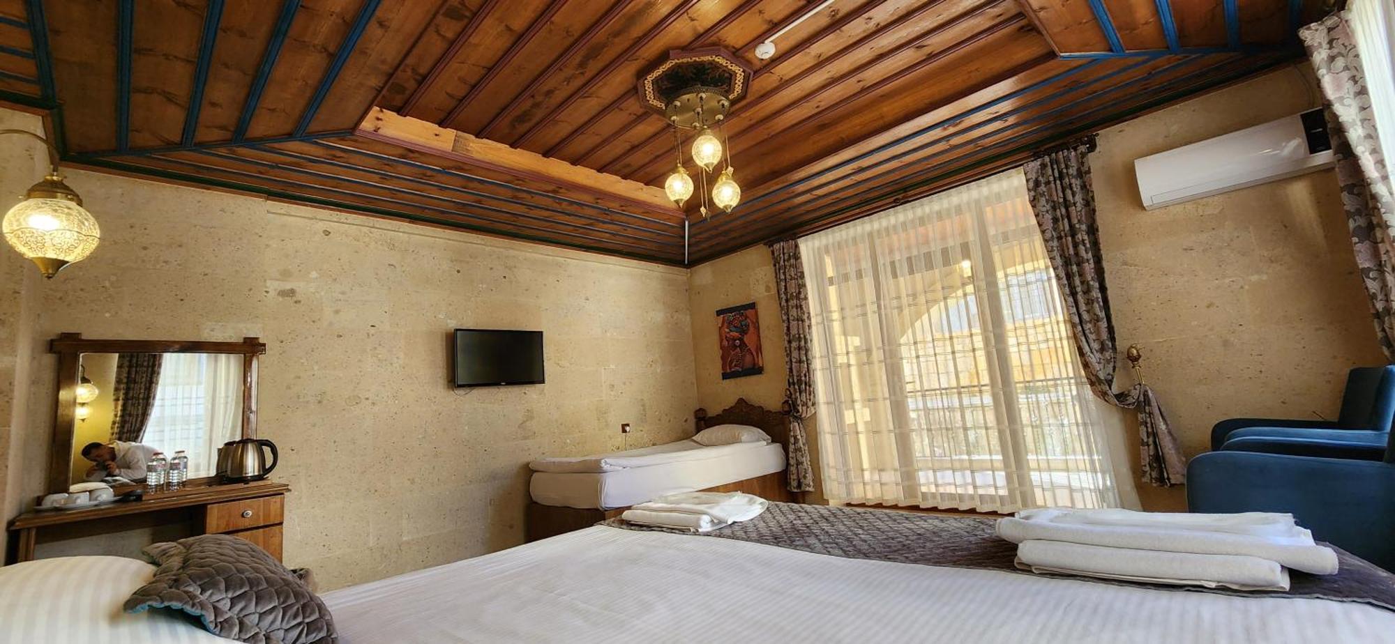 Cappadocia Elite Stone House Bed and Breakfast Göreme Rum bild