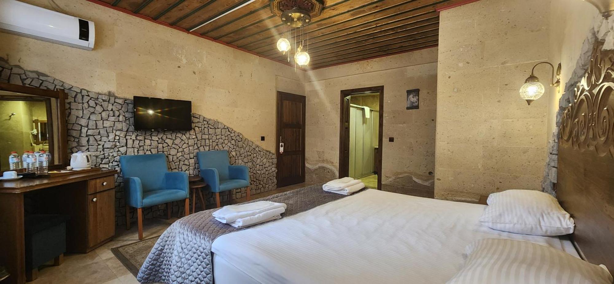 Cappadocia Elite Stone House Bed and Breakfast Göreme Rum bild